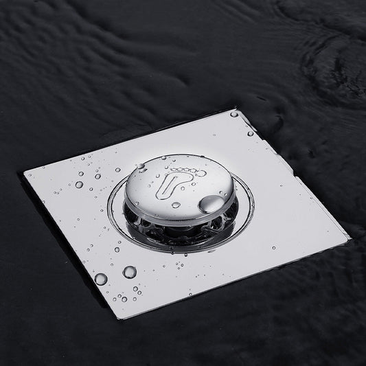 Dusjgulvavløpsdeksel med fjærkjerne