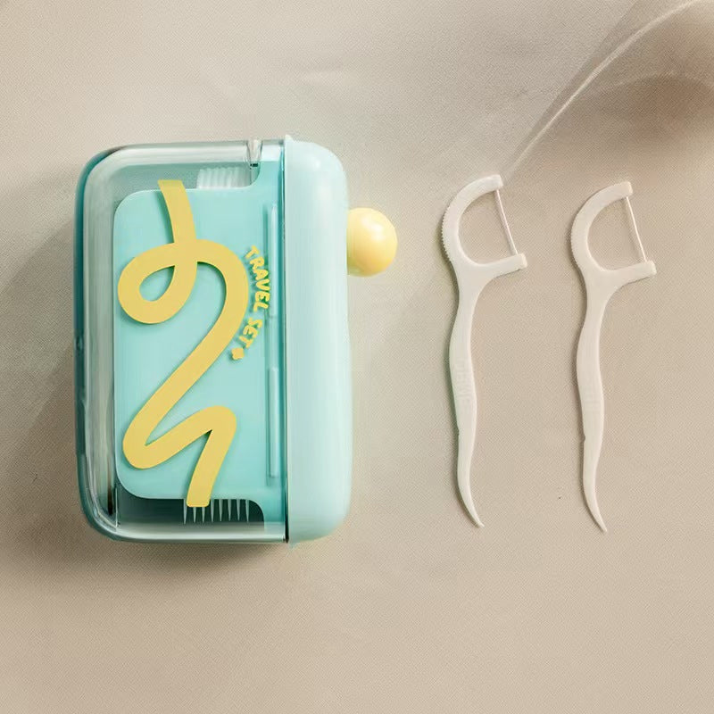 Automatisk popup-dispenser for tanntråd