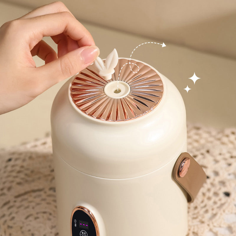 🥳2026 HOT SALE🥳💞Over 50 000 solgte! 🍲⏰ 50 % RABATT! Bærbar elektrisk gryte – 900 ml, 9 timers timerfunksjon, 5 varmenivåer. Non-stick-belegg, skjult stikkontakt, sklisikker bunn. Lager ris, suppe og grøt – perfekt for 1–2 personer eller på reise! 🏠✅