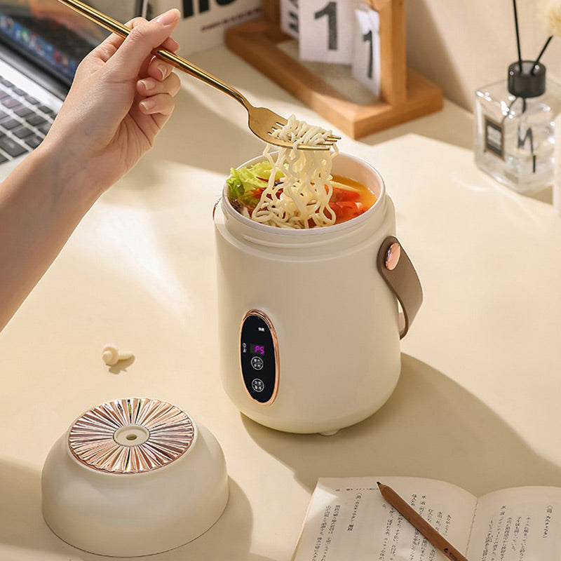 🥳2026 HOT SALE🥳💞Over 50 000 solgte! 🍲⏰ 50 % RABATT! Bærbar elektrisk gryte – 900 ml, 9 timers timerfunksjon, 5 varmenivåer. Non-stick-belegg, skjult stikkontakt, sklisikker bunn. Lager ris, suppe og grøt – perfekt for 1–2 personer eller på reise! 🏠✅